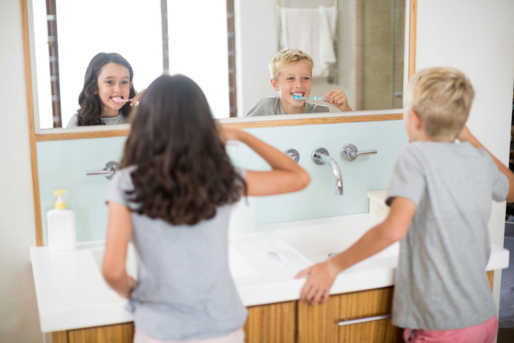 Kids Brushing Their Teeth Together